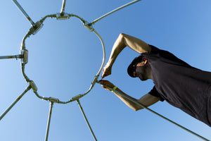 Assembling tent's sky oculus. Photo by Melissa Blackall. 